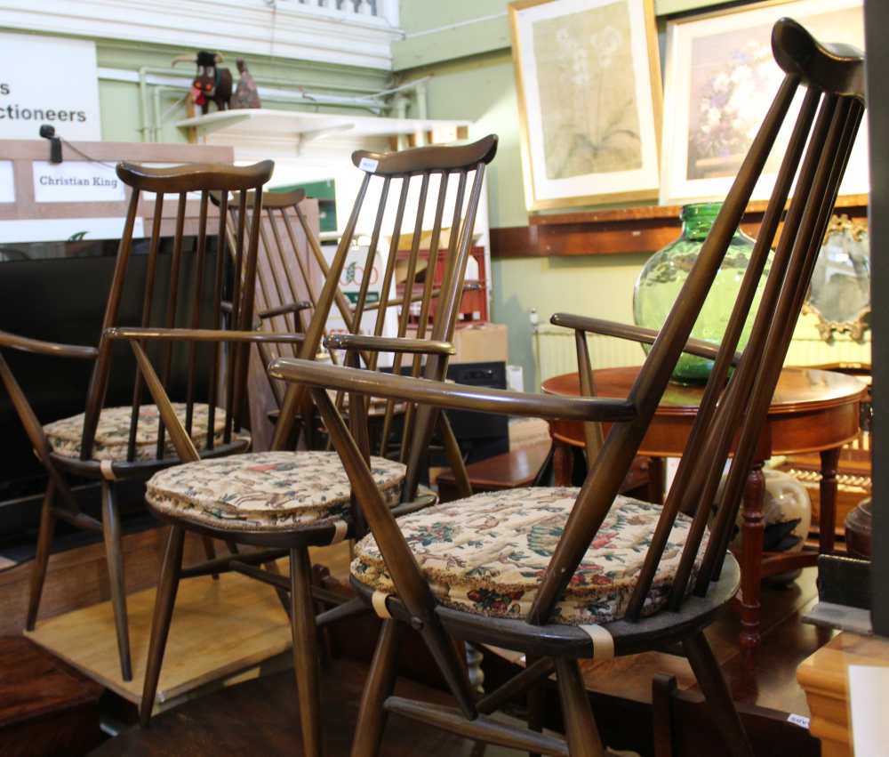 AN ERCOL DINING SUITE comprising circular topped two flap table and four high stick backed armchairs - Image 2 of 2