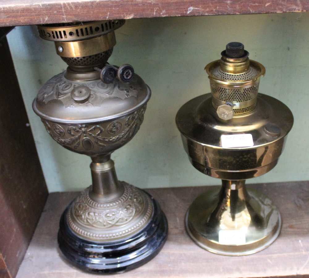 TWO METAL BASED OIL LAMPS