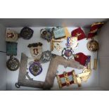 A COLLECTION OF MASONIC BADGES & REGALIA to include a 9ct gold example, and numerous other