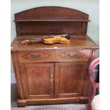 A 19TH CENTURY OAK FINISHED SIDE CUPBOARD with single shelved upstand back, plain rectangular top