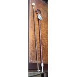 A LEATHER HANDLED METAL SHAFTED FOLDING SHOOTING STICK together with a rosewood finished walking