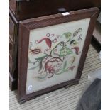A FIRST QUARTER 20TH CENTURY WOODEN FRAMED FOLDING FIRE SCREEN, with floral design stitched