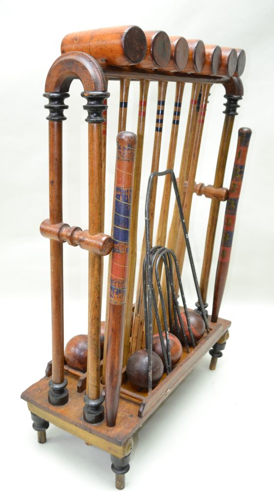 A WOODEN CROQUET SET ON STAND comprising seven mallets, six balls, two posts & five iron hoops, - Image 5 of 6