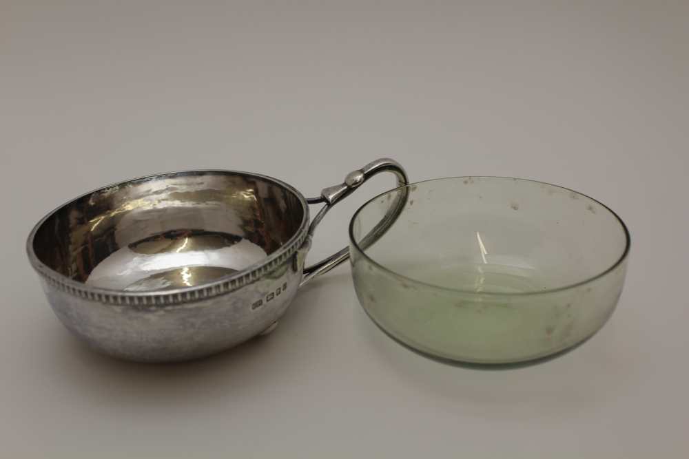 GUILD OF HANDICRAFT , A SINGLE HANDLED SILVER PORRINGER, planished bowl with egg & dart rim, the - Image 4 of 4