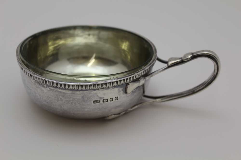 GUILD OF HANDICRAFT , A SINGLE HANDLED SILVER PORRINGER, planished bowl with egg & dart rim, the - Image 2 of 4