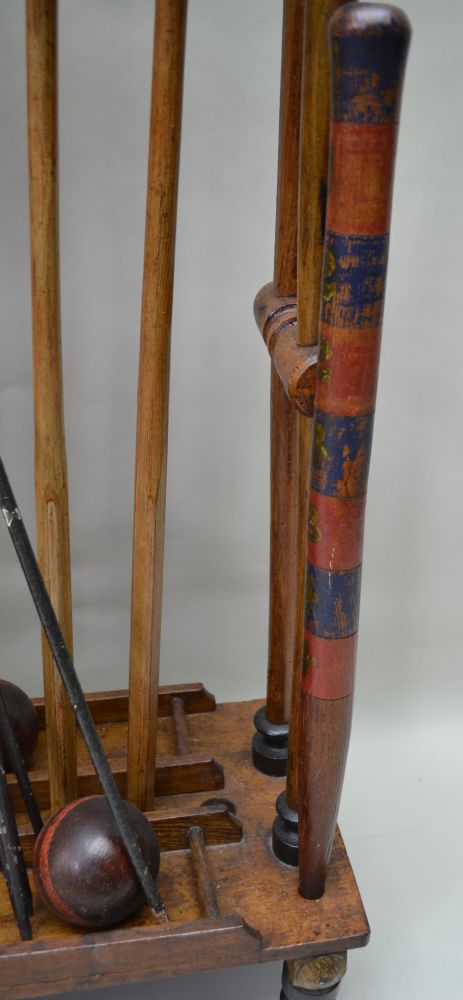 A WOODEN CROQUET SET ON STAND comprising seven mallets, six balls, two posts & five iron hoops, - Image 4 of 6