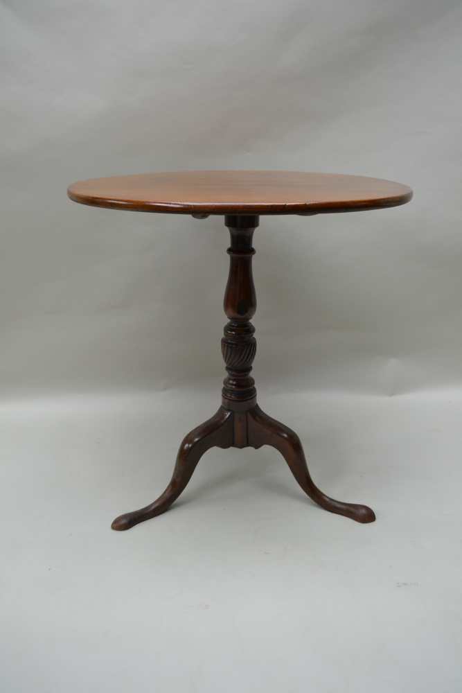 A 19TH CENTURY CIRCULAR TILT TOP TABLE on turned baluster column on three downswept legs, 72cm x - Image 2 of 3