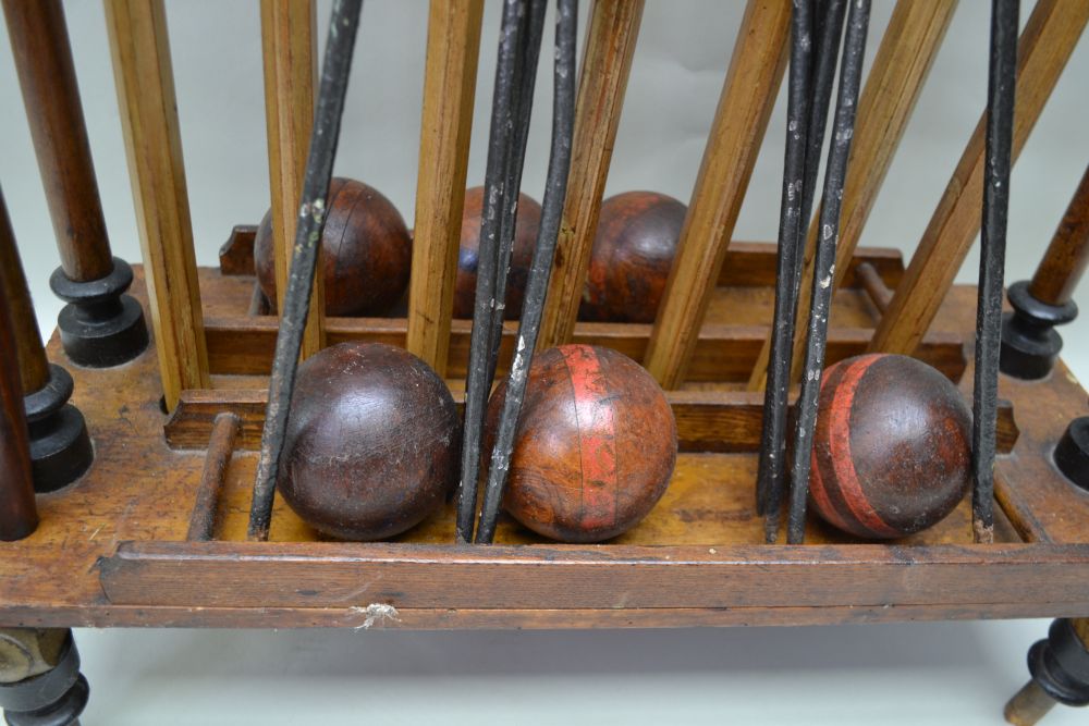A WOODEN CROQUET SET ON STAND comprising seven mallets, six balls, two posts & five iron hoops, - Image 3 of 6