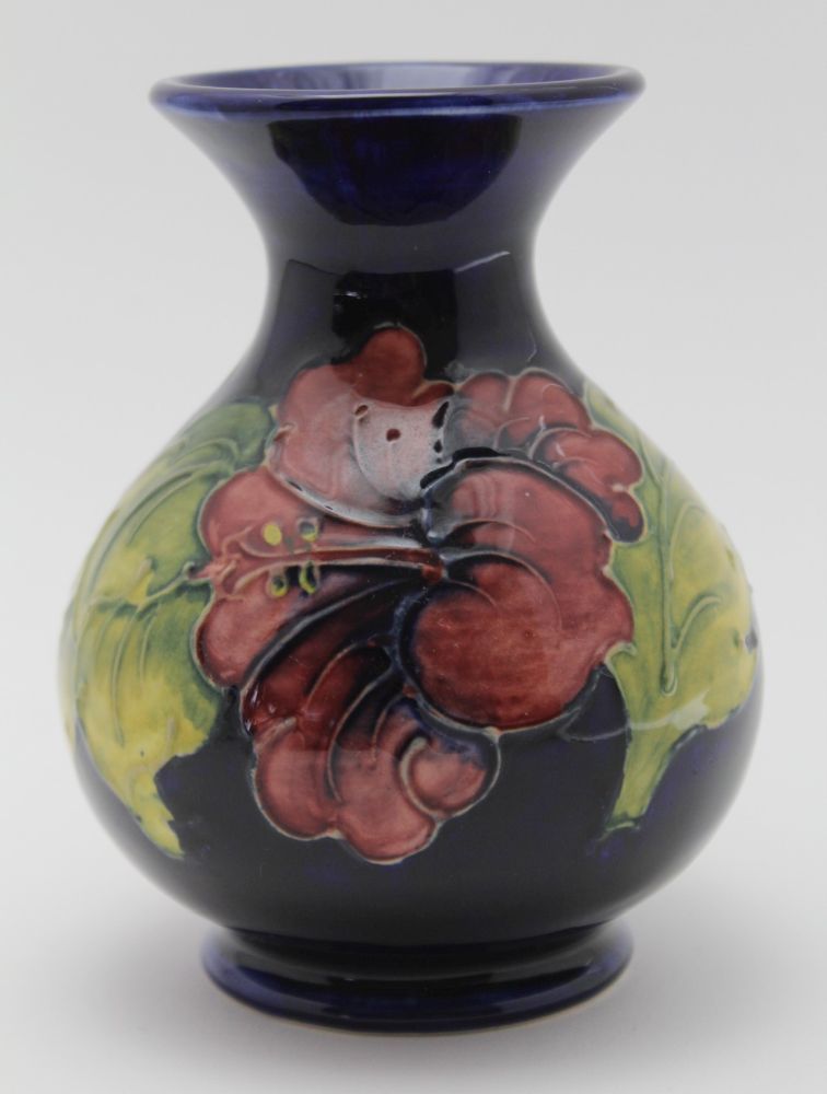 A MOORCROFT POTTERY VASE, tube lined and painted Hibiscus patten and a painted and impressed factory - Image 2 of 3