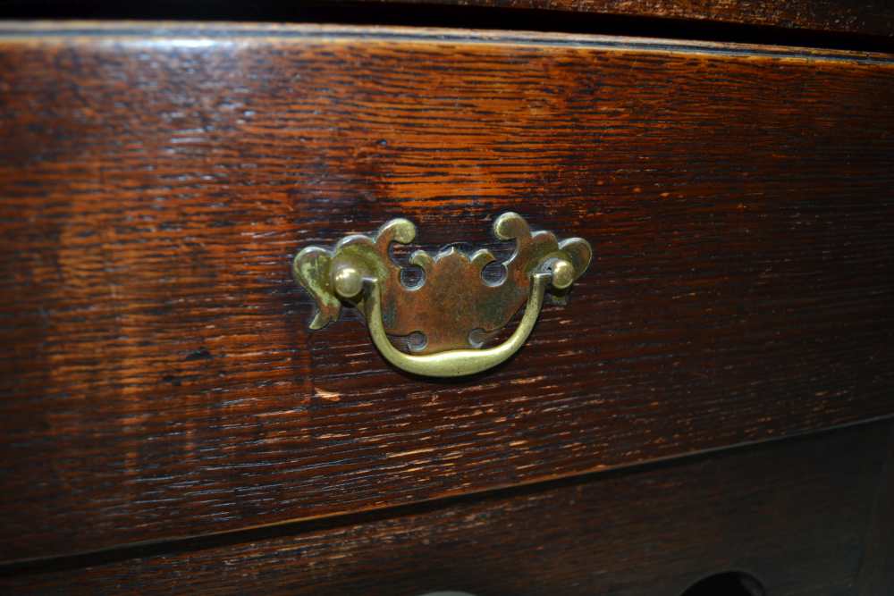 A LATE GEORGE III OAK DRESSER, the base fitted three drawers, with brass handles over shaped aprons, - Image 2 of 5