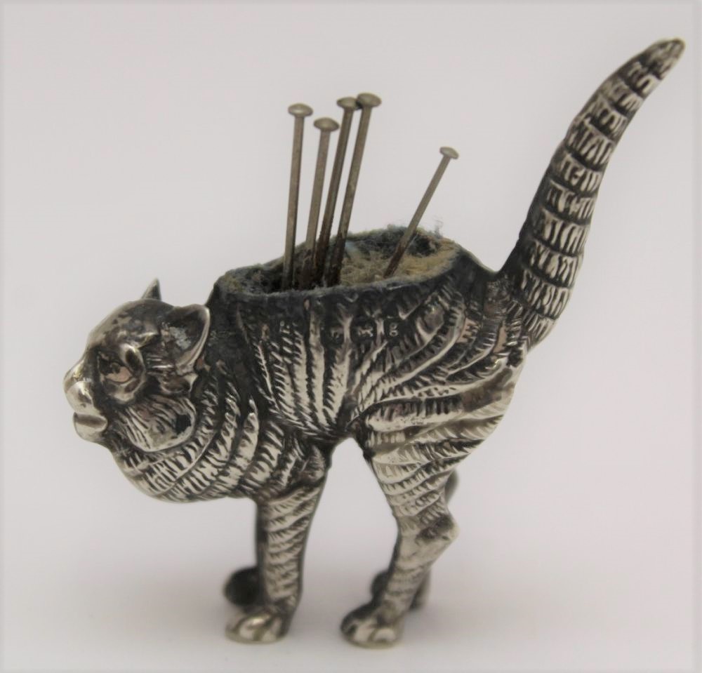 AN EDWARDIAN NOVELTY SILVER PIN CUSHION, modelled as an arch backed cat, by Levi and Salaman, - Image 4 of 4
