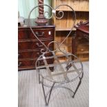 A GILT PATENATED METAL HEART BACKED CHAIR