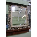 A FLORENTINE FRAMED RECTANGULAR BEVEL PLATE WALL MIRROR