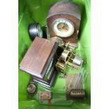 A GREEN CRATE OF CLOCKS & CLOCK PARTS