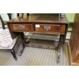 A REPRODUCTION MAHOGANY FINISHED COFFEE TABLE SIZED SOFA TABLE of typical form and construction