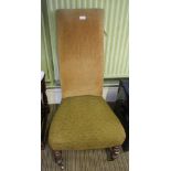 A 19TH CENTURY UPHOLSTERED HIGH BACKED NURSING CHAIR, on turned fore legs and plain outswept rear,