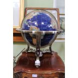 A HARDSTONE TABLE GLOBE on brushed metal stand