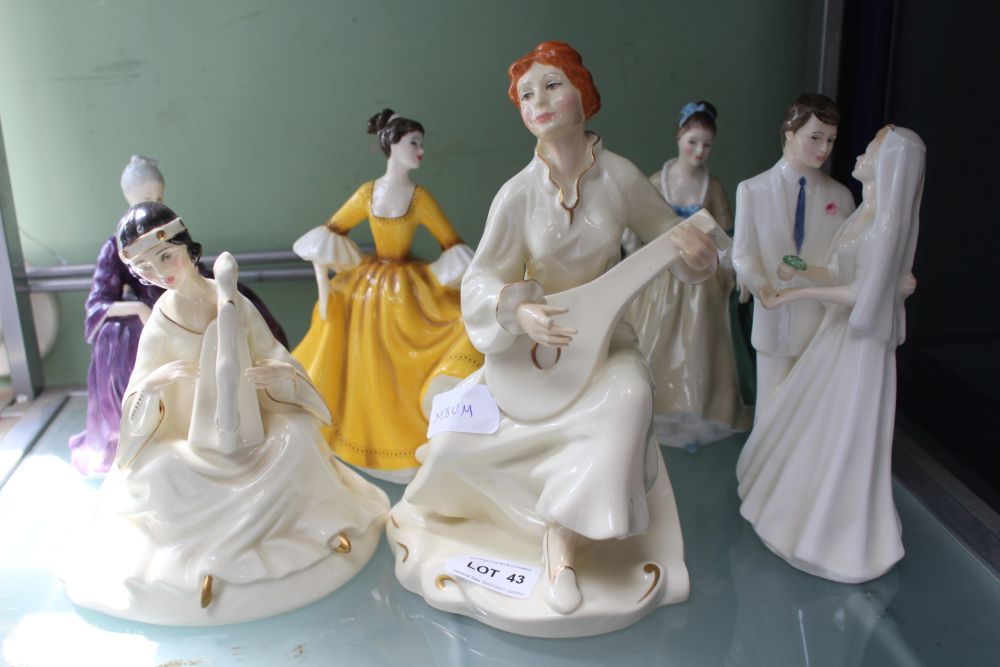 A SELECTION OF PORCELAIN FIGURINES the majority Royal Doulton