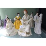 A SELECTION OF PORCELAIN FIGURINES the majority Royal Doulton