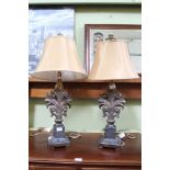 A PAIR OF DECORATIVE CASE TABLE LIGHTS with shades