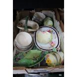 A BOX OF DOMESTIC POTTERY the majority floral decorated