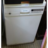 A SIEMENS BRANDED SLENDER UNDERCOUNTER DISHWASHER