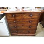 A 19TH CENTURY MAHOGANY FINISHED CHEST OF FIVE DRAWERS
