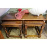 A GOOD QUALITY REPRODUCTION RECTANGULAR TOPPED COFFEE TABLE, with two smaller slide-out orphans,