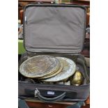 A SMALL MODERN TRAVEL BAG containing selection of metalwares, majority brass but to include