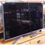 AN LG BRANDED 43'' FLATSCREEN TELEVISION, with remote control