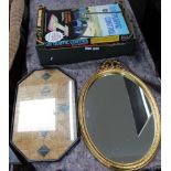 A BOX CONTAINING A SELECTION OF BOXED GAMES together with an oval wall mirror, and a wooden framed