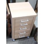 A MODERN BLONDE WOOD FIVE DRAWER SIDE CABINET