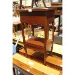 A REPRODUCTION MAHOGANY COLOURED HARDWOOD OCCASIONAL TABLE, with box storage undertier