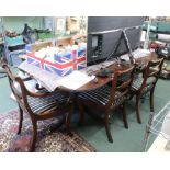 A GOOD QUALITY REPRODUCTION MAHOGANY FINISHED DINING SUITE, comprising oval crossbanded topped