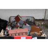 A BOX CONTAINING A SELECTION OF MODEL TRAIN HOUSES and other railway related items