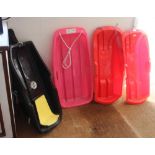 FOUR MOULDED PLASTIC CHILDREN'S SNOW SLEDGES