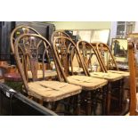 A SET OF SIX 20TH CENTURY CHAIRS in Gothic Revival taste, pierced Lion armorial crests to back