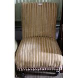 A LATE 19TH CENTURY UPHOLSTERED LOW BACK NURSING CHAIR
