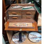 A WOODEN BOX CONTAINING MINIATURE MODEL BOATS, and model making equipment
