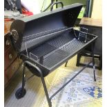 A VIRTUALLY BRAND NEW BLACK FINISHED CYLINDER TOP PORTABLE BARBECUE