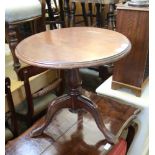 A MAHOGANY FINISHED CIRCULAR TOPPED LOW TABLE