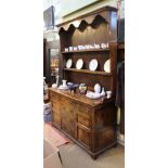 A WELL MADE LATE 19TH CENTURY COUNTRY KITCHEN DRESSER, with tall twin shelved plate rack back,