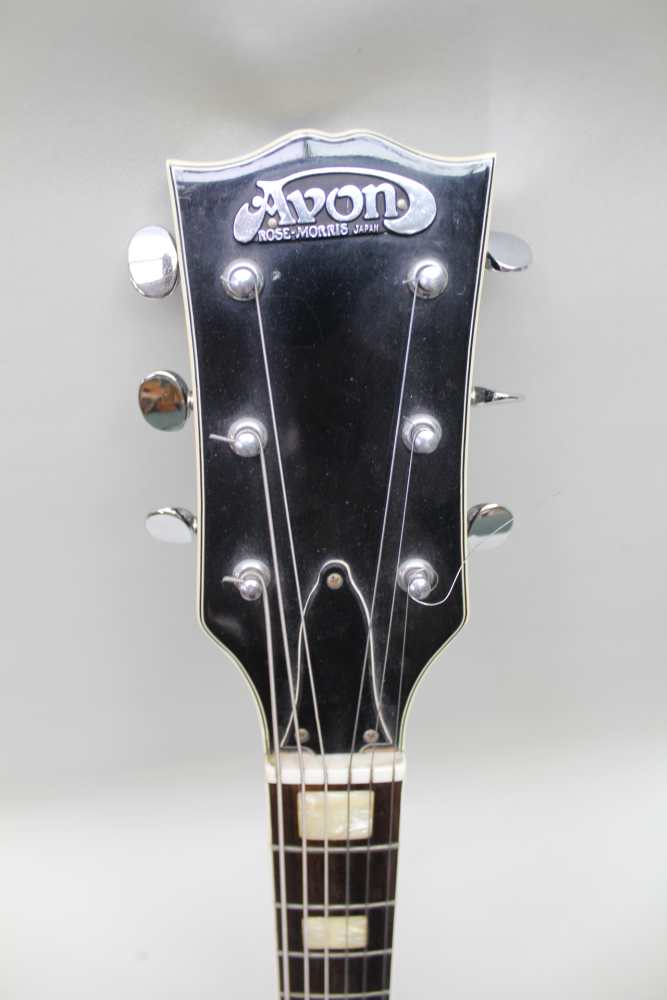 A ROSE MORRIS 'AVON' BRANDED LES PAUL COPY GUITAR finished in black, together with a Gator hardshell - Image 4 of 8