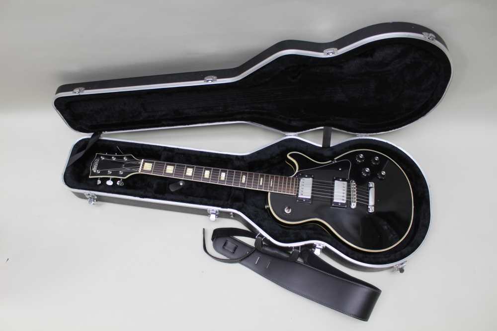 A ROSE MORRIS 'AVON' BRANDED LES PAUL COPY GUITAR finished in black, together with a Gator hardshell - Image 2 of 8