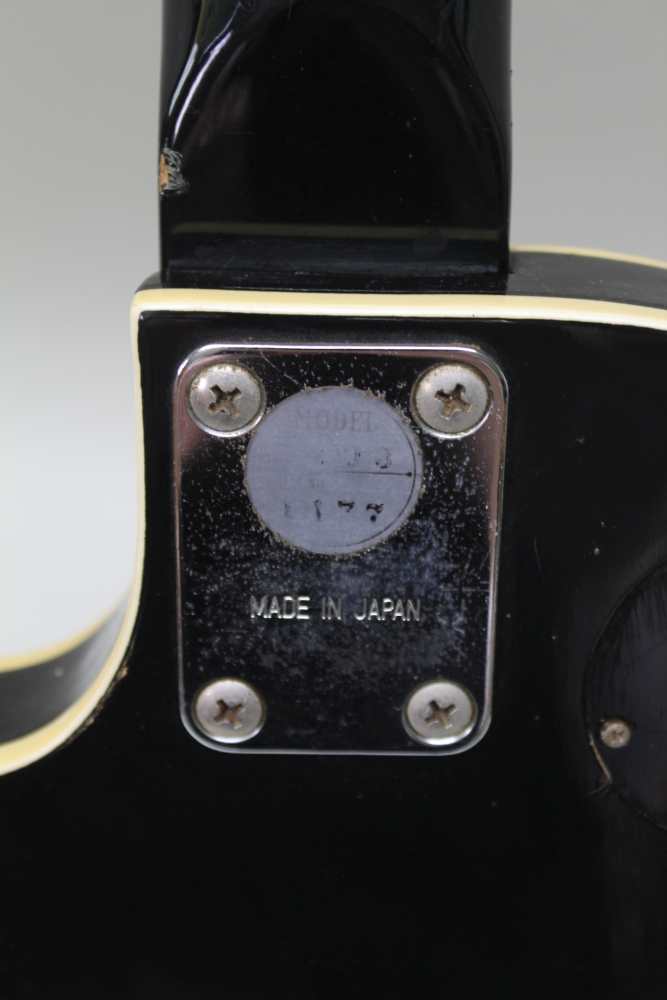 A ROSE MORRIS 'AVON' BRANDED LES PAUL COPY GUITAR finished in black, together with a Gator hardshell - Image 6 of 8