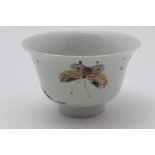 A CHINESE PORCELAIN TEA BOWL, flared rim, painted in the famille verte palette, with butterfly,