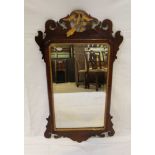 A 19TH CENTURY MAHOGANY FRET CUT FRAMED BEVEL PLATE WALL MIRROR with gilt highlighted carved ho-ho