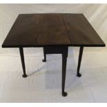 A GEORGIAN MAHOGANY TWIN FLAP TOPPED TABLE on single gateleg action on four turned tapering plain