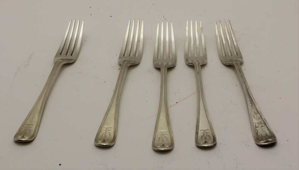 CHARLES BOYTON A set of five silver dessert forks, engraved with a spread eagle crest, London