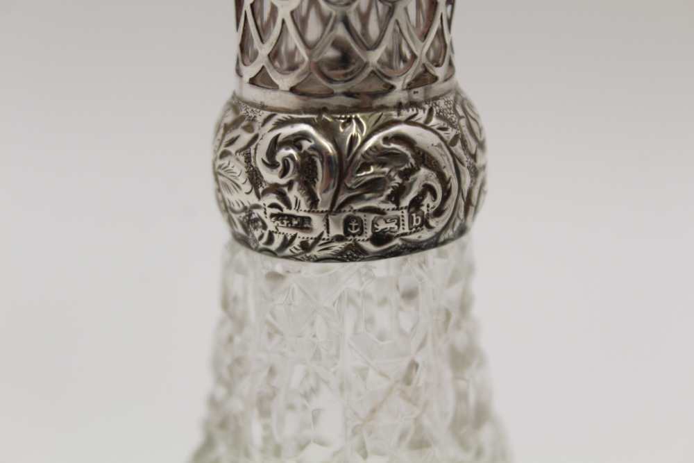 A PAIR OF EDWARDIAN SILVER CANDLESTICKS, embossed ribbon and bell husk swags on circular bases, - Image 8 of 9